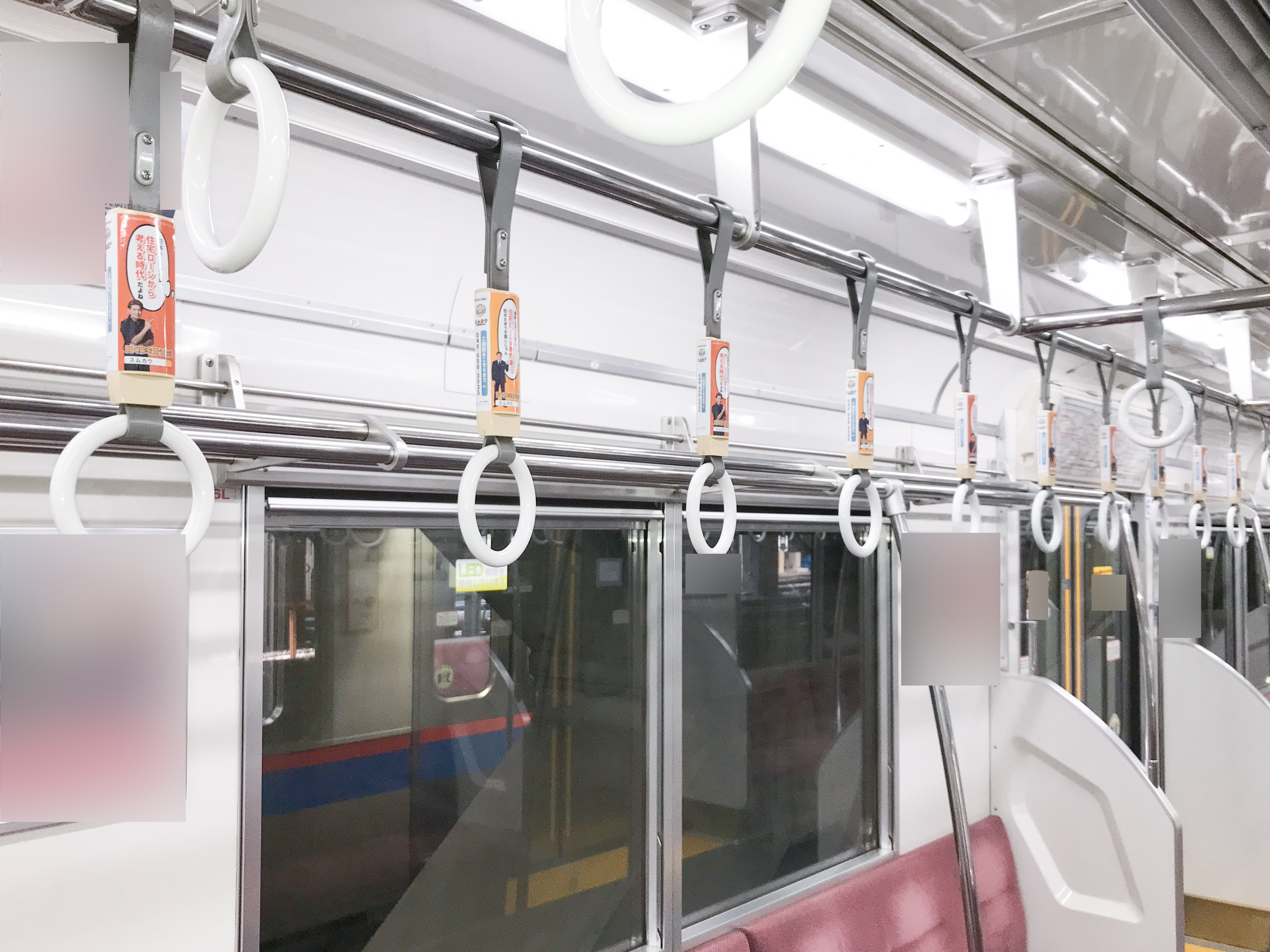 都営地下鉄のスムカウ吊手広告